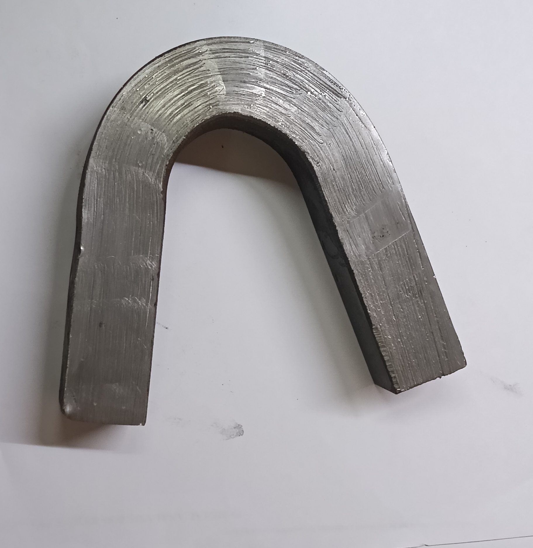 Bend test specimen bent to a U shape