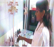 Chemical analysis lab technician at work