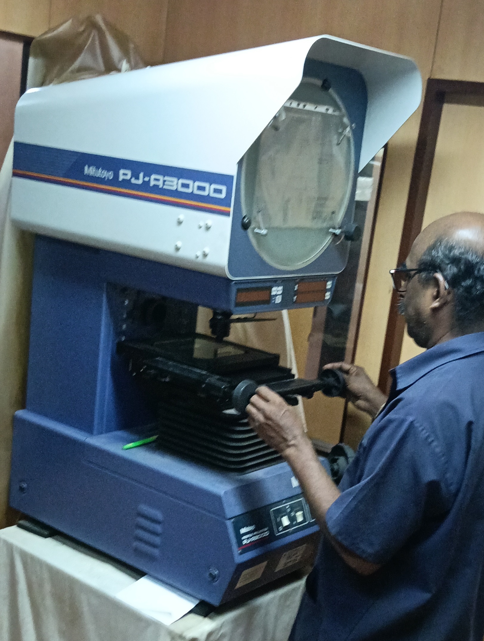 Profile projector used for dimensional inspection